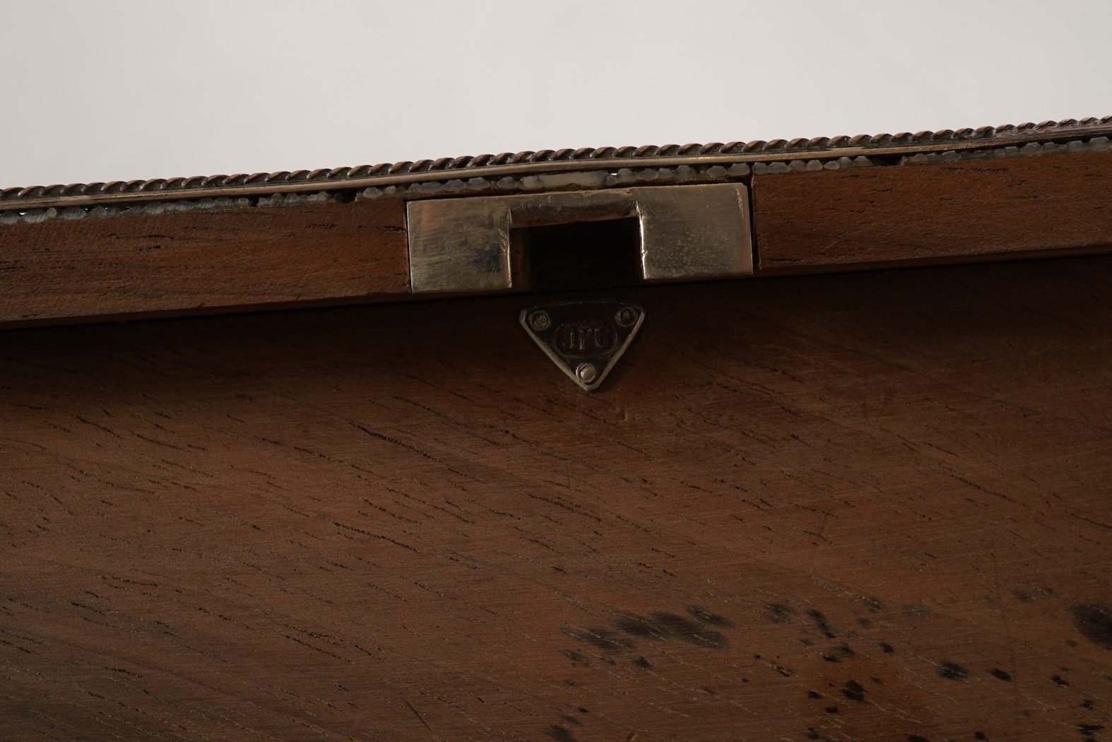 An early 20th century Arts & Crafts silver and shagreen mounted cigarette box with hinged cover, by John Paul Cooper